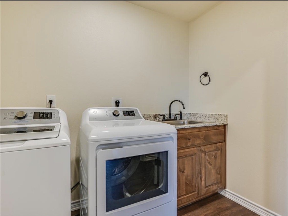 113 Calvin Smith Ln. Lane Jarrell, TX 76537 - Photo 10 of 16 a view of storage and utility room with washer and dryer