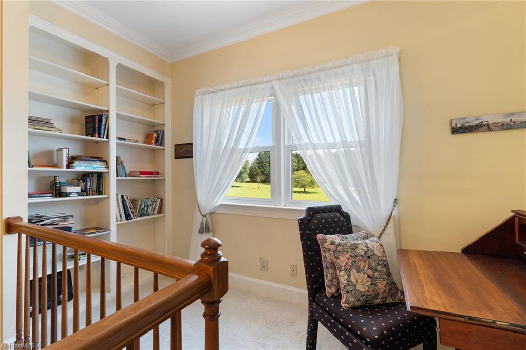 5701 Bunch Road Oak Ridge, NC 27310 - Photo 24 of 50 Loft with built ins at the top of the steps