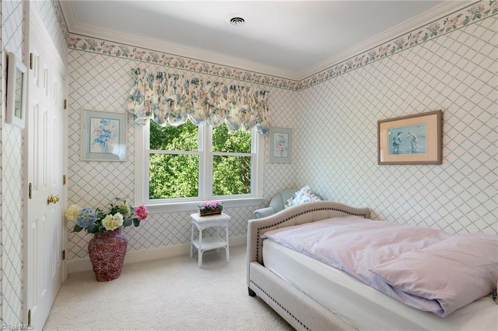 5701 Bunch Road Oak Ridge, NC 27310 - Photo 36 of 50 Upstairs back bedroom beside the primary