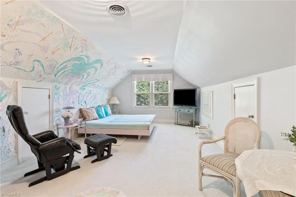 5701 Bunch Road Oak Ridge, NC 27310 - Photo 38 of 50 Upstairs bedroom/bonus with private bathroom and private entrance from Laundry room and garage.