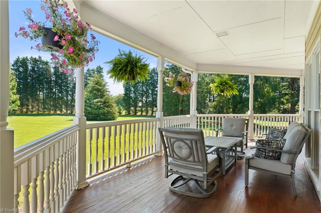 5701 Bunch Road Oak Ridge, NC 27310 - Photo 7 of 50 Front Porch sitting!