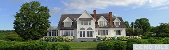 969 Center Hill Road Copake, NY 12516 - Photo 1 of 10 a front view of a house with a garden