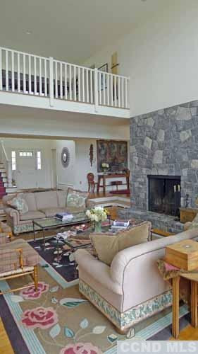 969 Center Hill Road Copake, NY 12516 - Photo 6 of 10 a living room with furniture and a fireplace