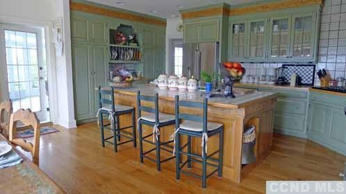 969 Center Hill Road Copake, NY 12516 - Photo 8 of 10 a dining room with furniture and wooden floor