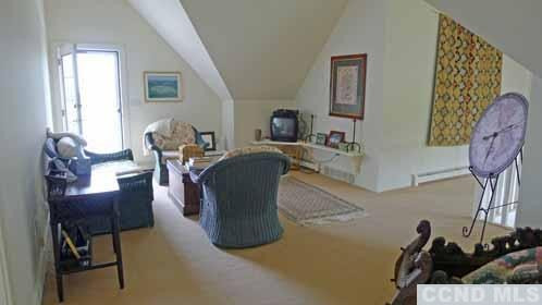 969 Center Hill Road Copake, NY 12516 - Photo 9 of 10 a living room with furniture and a window