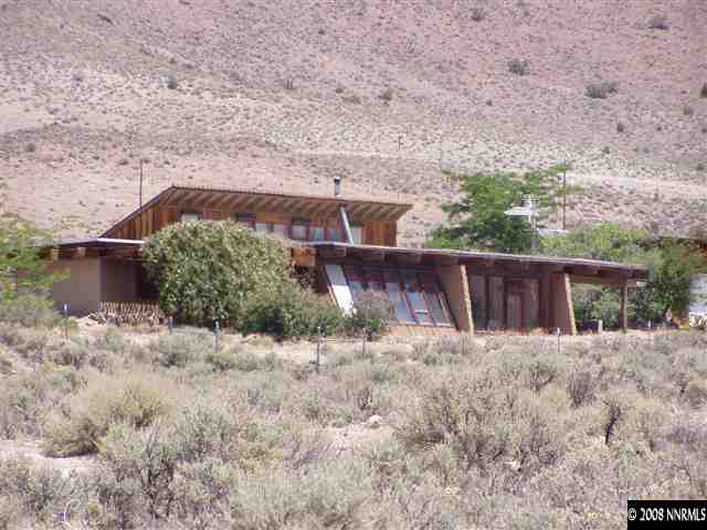 1000 Flagstone Road Reno, NV 89510 - Photo 1 of 8 a backyard of a house with lots of green space