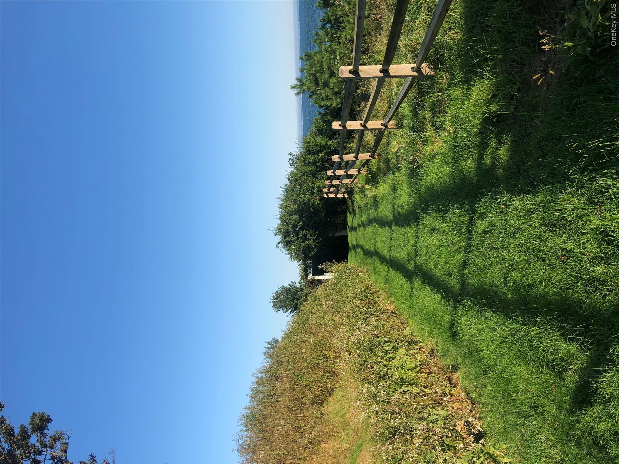 2840 Stars Road East Marion, NY 11939 - Photo 43 of 43 a view of a lush green space