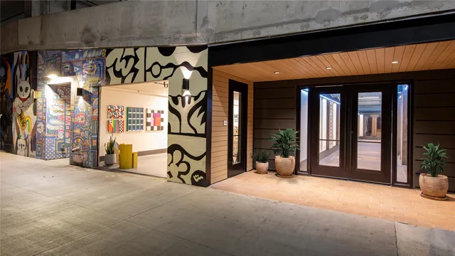 a view of a door with an outdoor seating