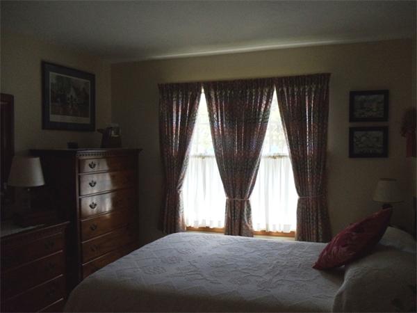 58 Tree Line Drive Barnstable, MA 02648 - Photo 22 of 29 a bedroom with a bed and a window