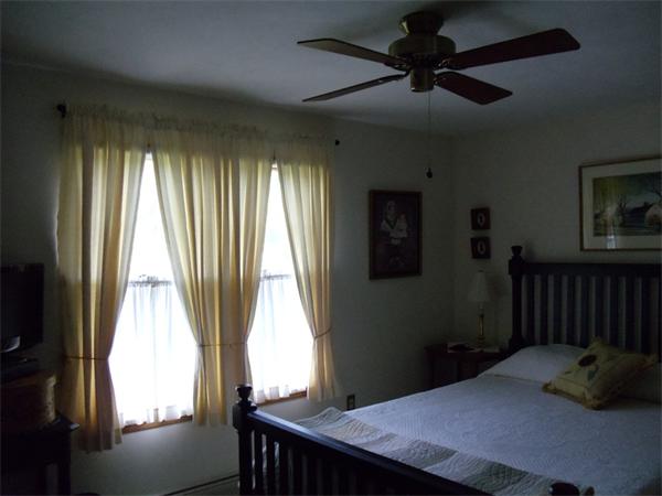 58 Tree Line Drive Barnstable, MA 02648 - Photo 25 of 29 a bedroom with a bed and a window