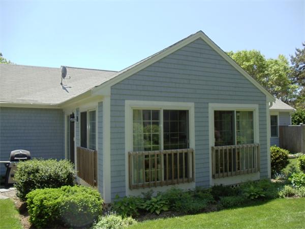 58 Tree Line Drive Barnstable, MA 02648 - Photo 3 of 29 front view of a house with a yard