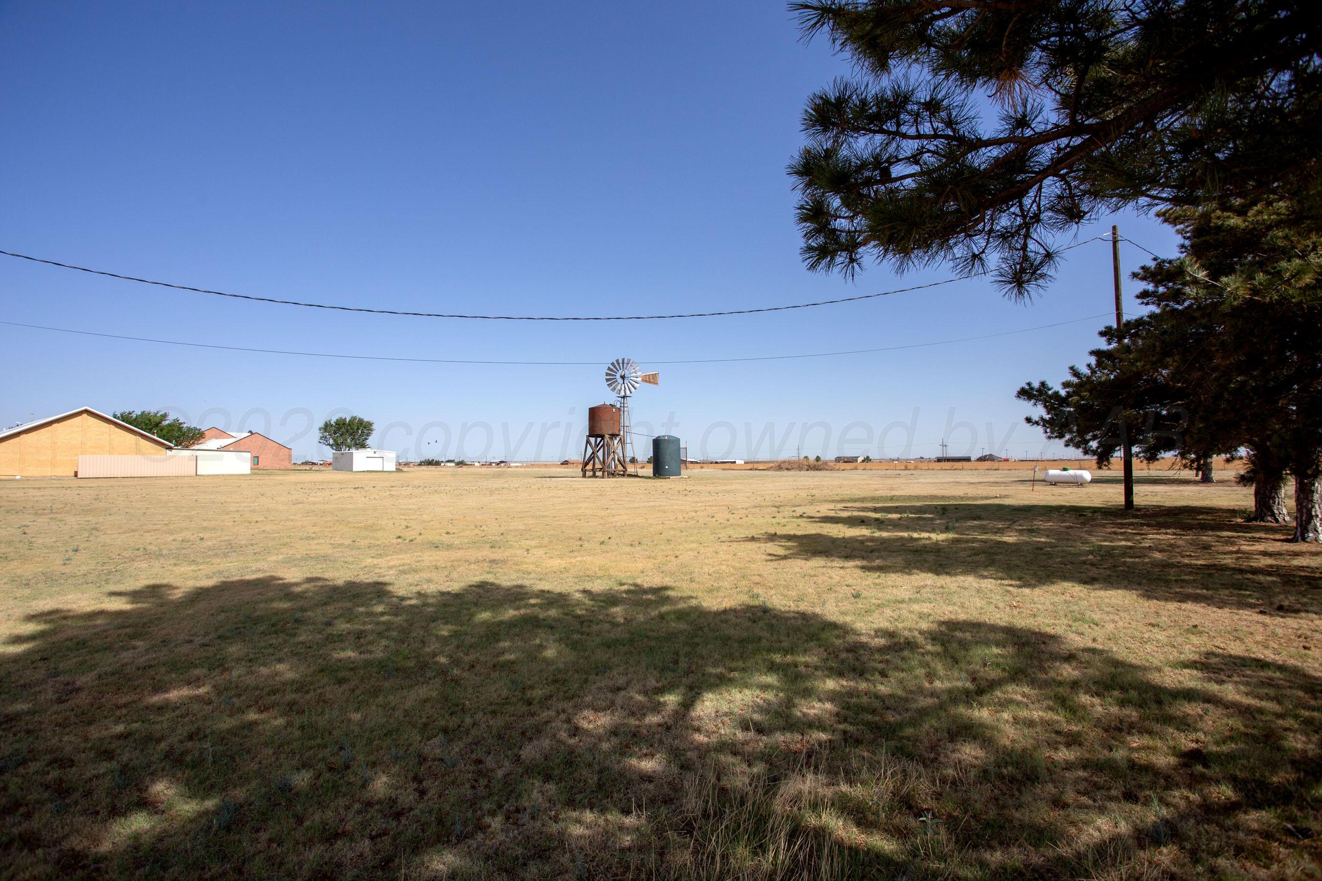 5003 Klinke Road Amarillo, TX 79108 - Photo 30 of 35 Back of acreage line is just past windmi