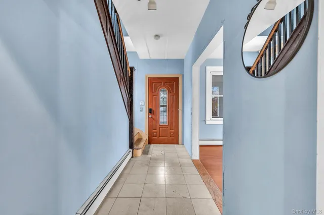 a view of a hallway with entryway