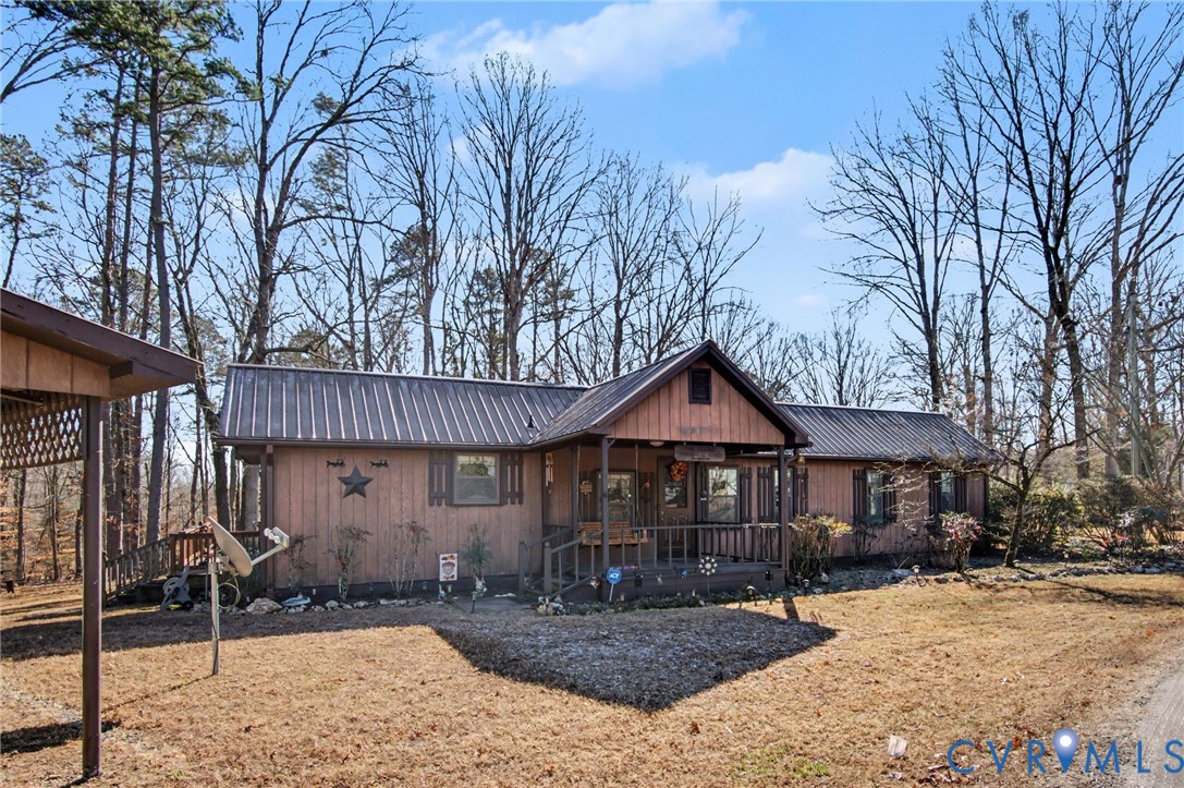 475 Dove Road Boydton, VA 23917 - Photo 3 of 45 a front view of a house with garden