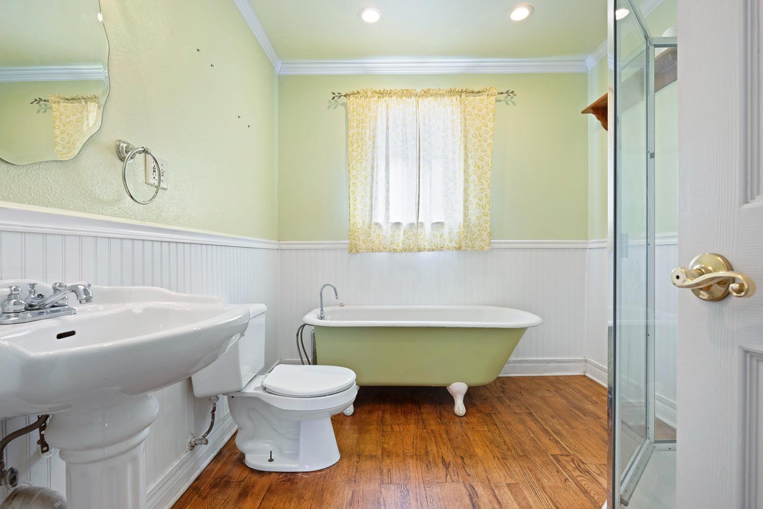 695 Monroe Street Coalinga, CA 93210 - Photo 26 of 44 a bathroom with a sink and a mirror