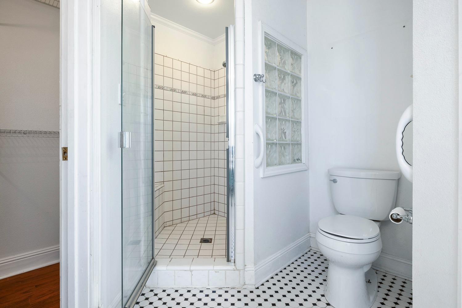 695 Monroe Street Coalinga, CA 93210 - Photo 39 of 44 a bathroom with a toilet and a shower