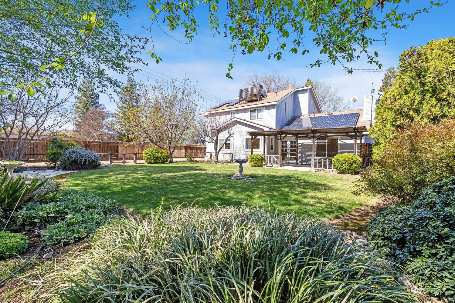 695 Monroe Street Coalinga, CA 93210 - Photo 42 of 44 a view of a house with a yard