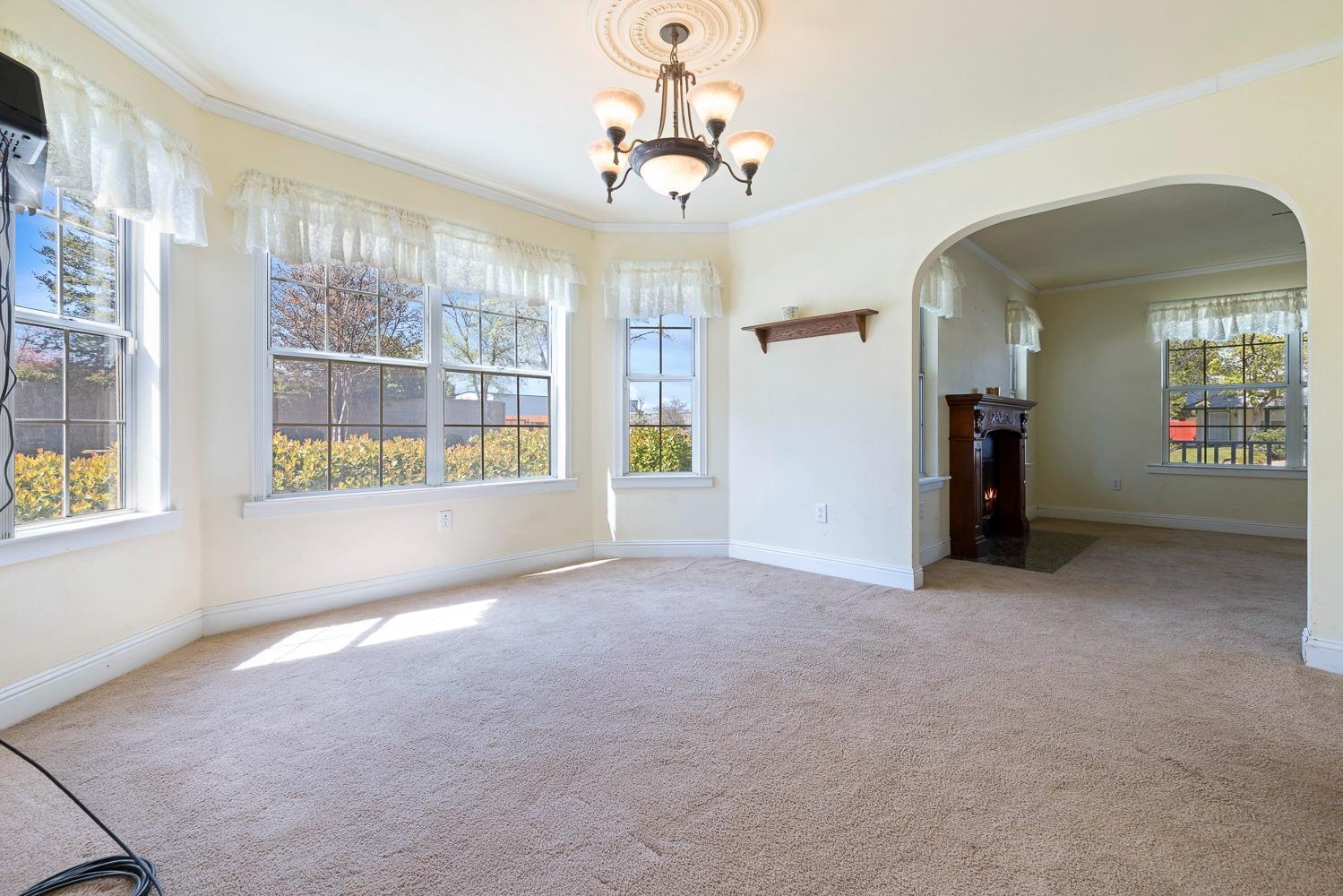 695 Monroe Street Coalinga, CA 93210 - Photo 10 of 44 a view of an empty room with a window