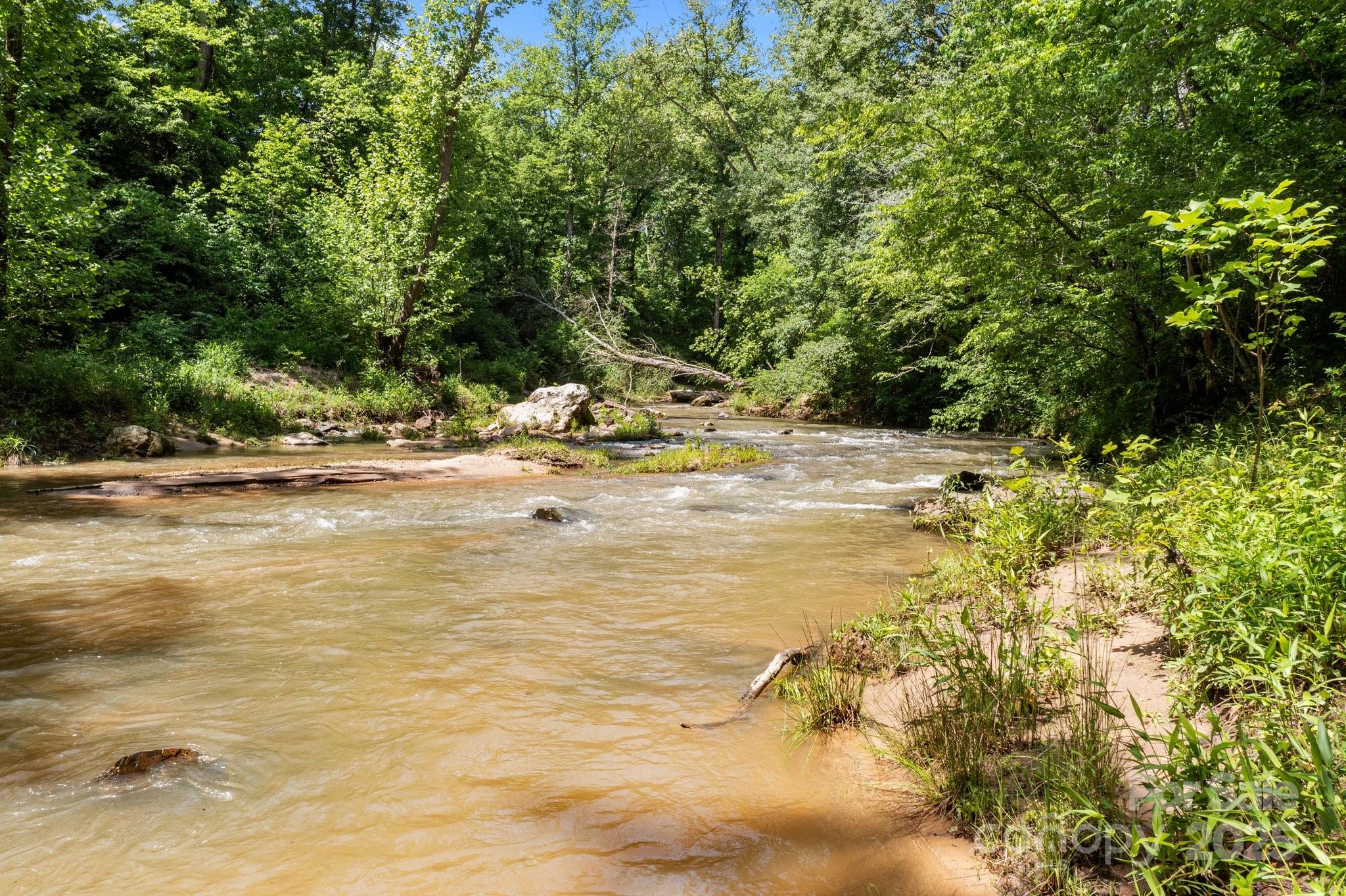 437 Linneys Mill Road Union Grove, NC 28689 - Photo 7 of 16 a view of a swimming pool with an outdoor space