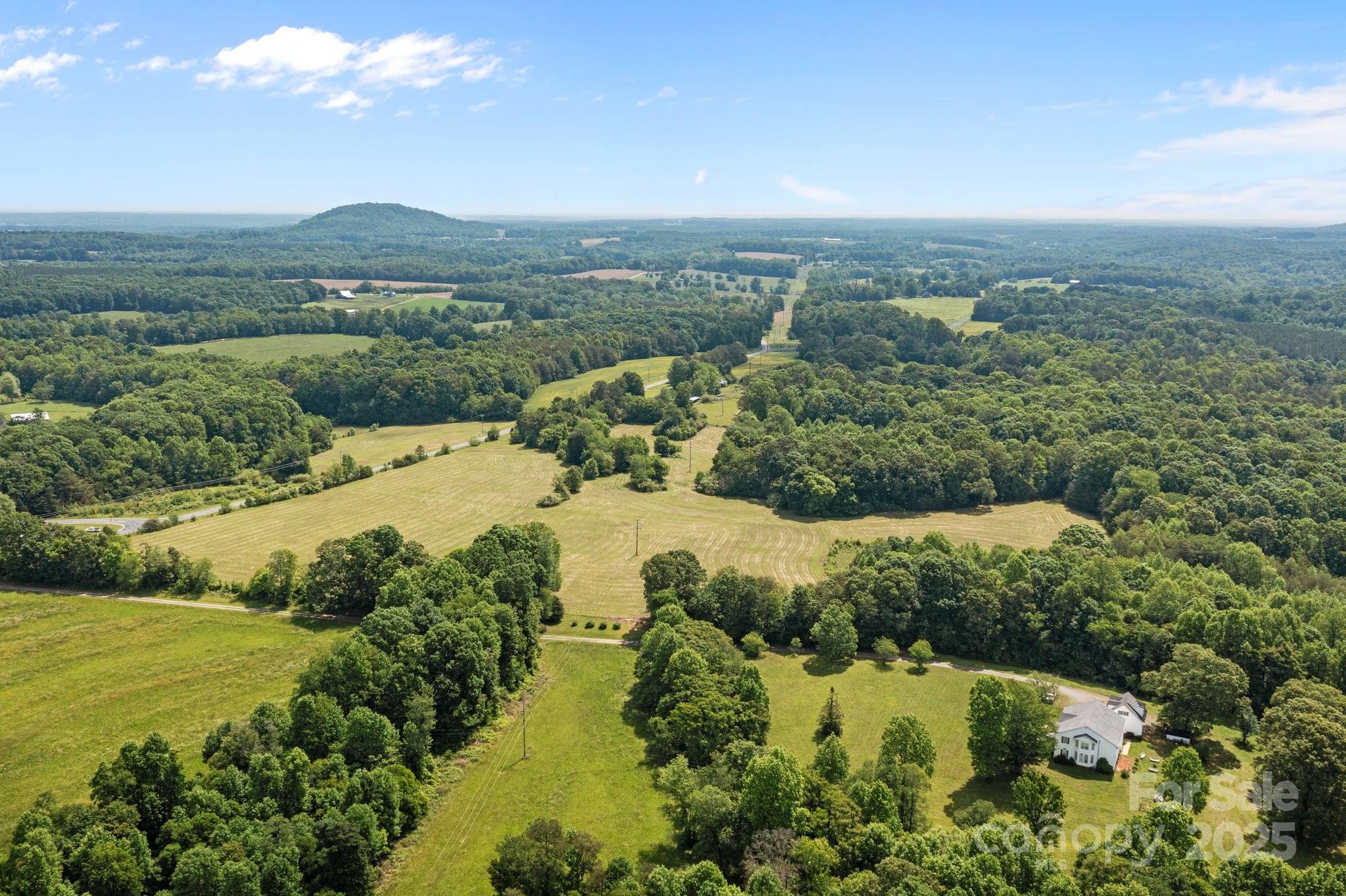 437 Linneys Mill Road Union Grove, NC 28689 - Photo 10 of 16 a view of a lake with a city