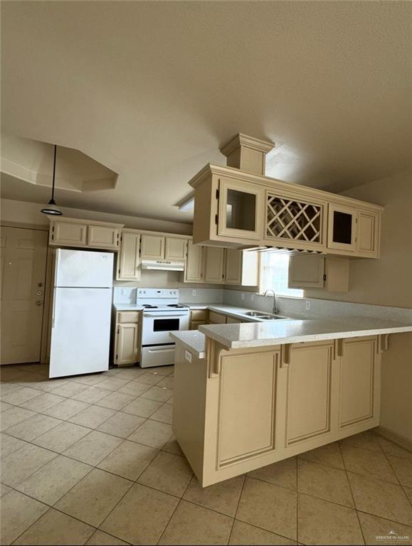 3603 Sheraton Avenue Pharr, TX 78577 - Photo 4 of 9 a kitchen with stainless steel appliances granite countertop a sink stove and cabinets