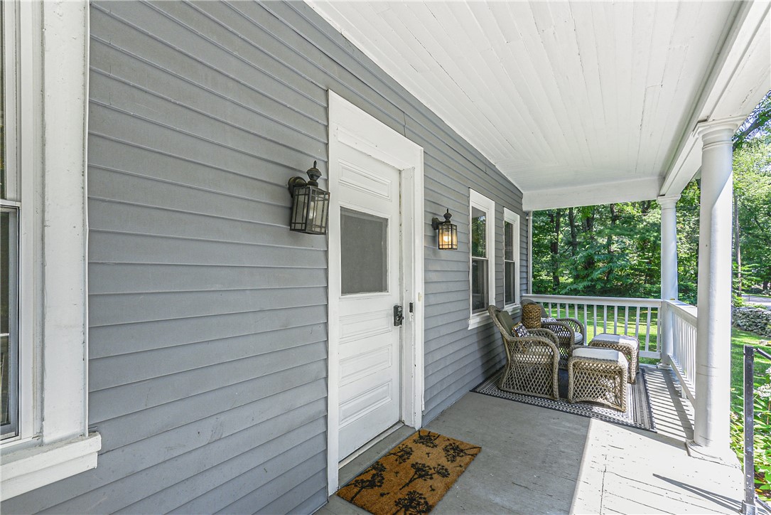 536 Potter Road North Kingstown, RI 02852 - Photo 3 of 29 The most cozy covered front porch for sitting and reading or enjoying the sounds of the birds.