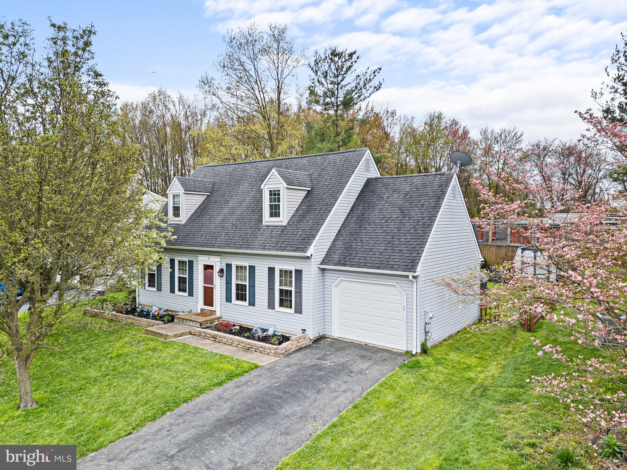 34 Sentry Lane Newark, DE 19711 - Photo 1 of 38 a aerial view of a house with yard and green space