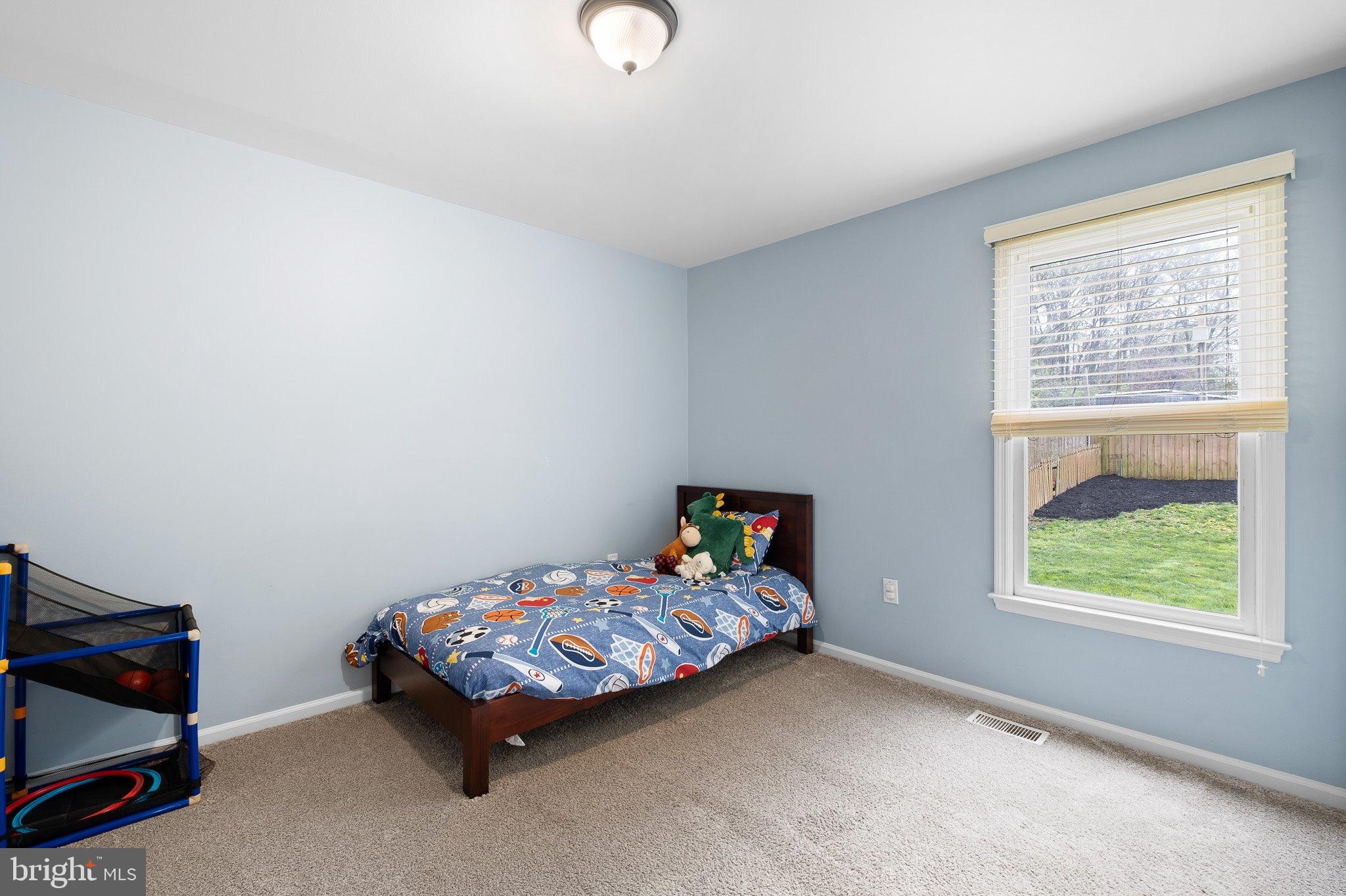 34 Sentry Lane Newark, DE 19711 - Photo 14 of 38 a bedroom with bed and a window