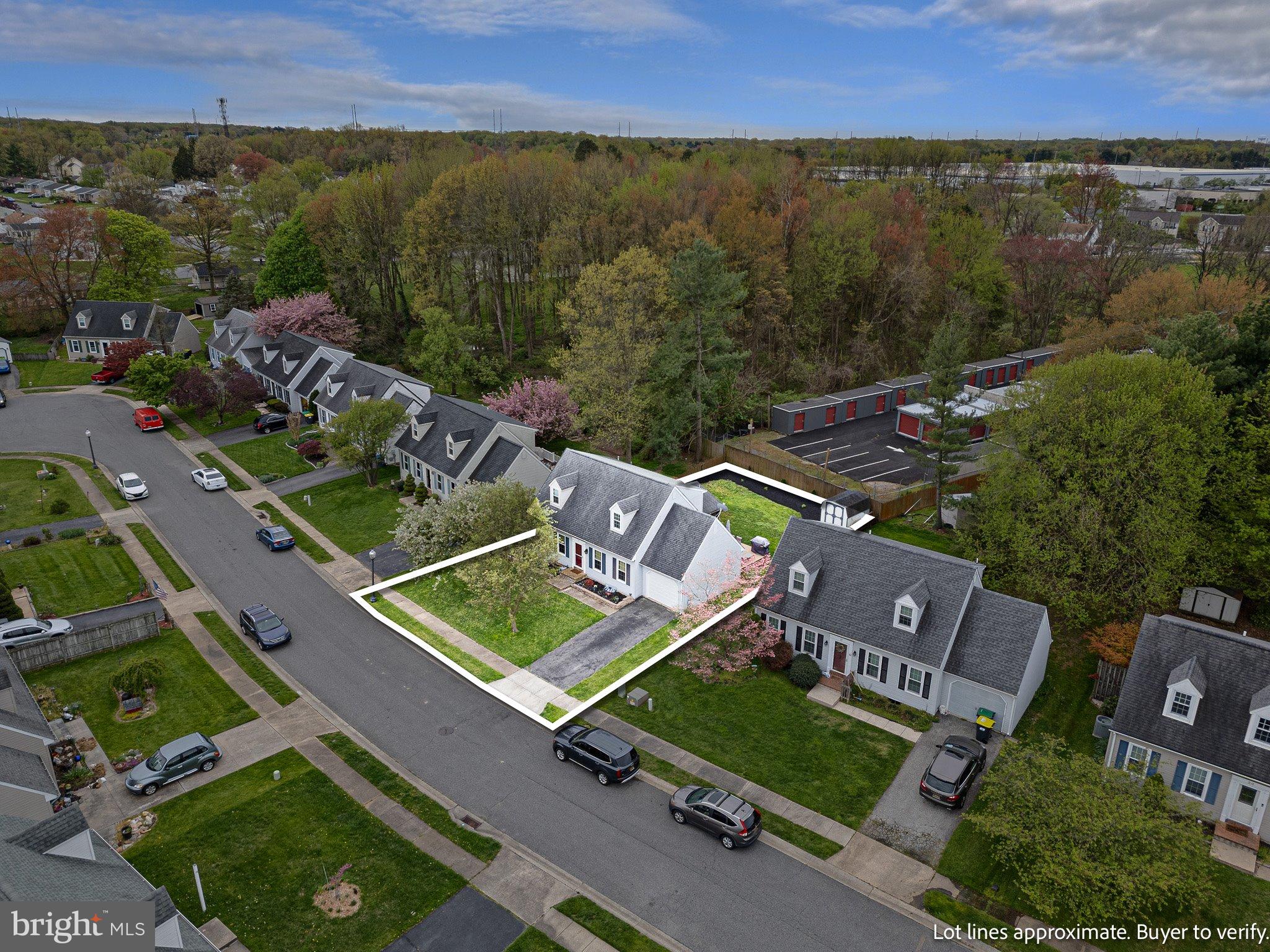34 Sentry Lane Newark, DE 19711 - Photo 25 of 38 an aerial view of a house with a yard and lake view