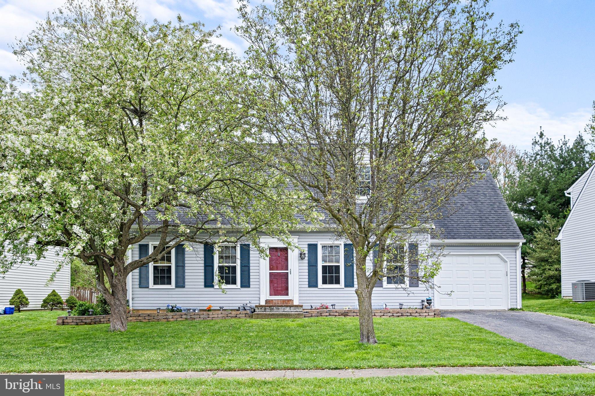 34 Sentry Lane Newark, DE 19711 - Photo 35 of 38 a front view of a house with a garden