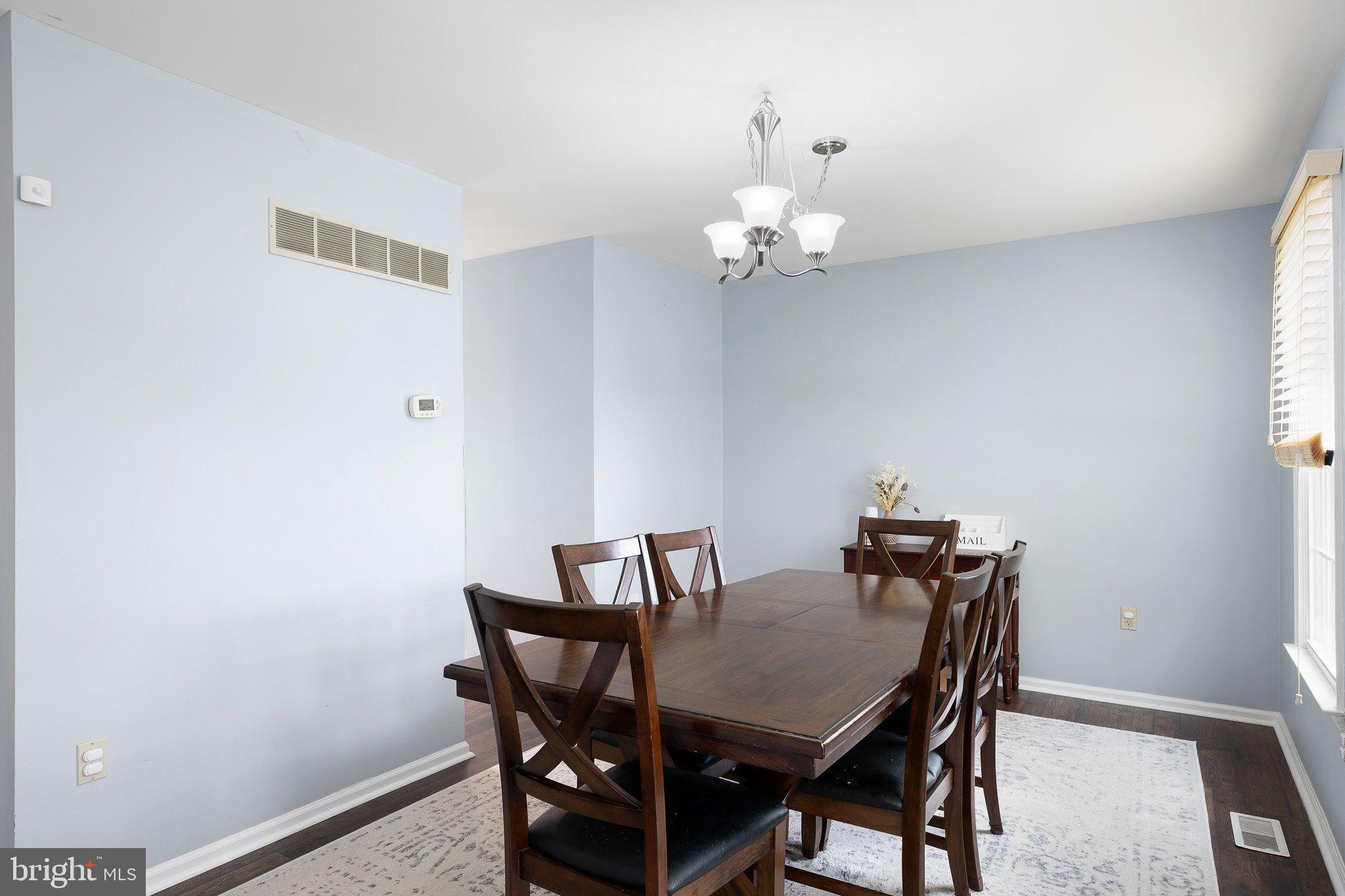 34 Sentry Lane Newark, DE 19711 - Photo 4 of 38 a view of a dining room with a table and chairs