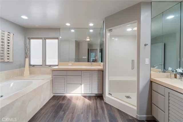 a view of a patio with couches and a fire pit