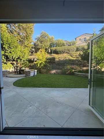 a view of a road with yard