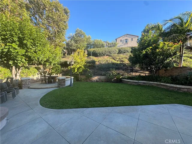 a view of a garden with houses