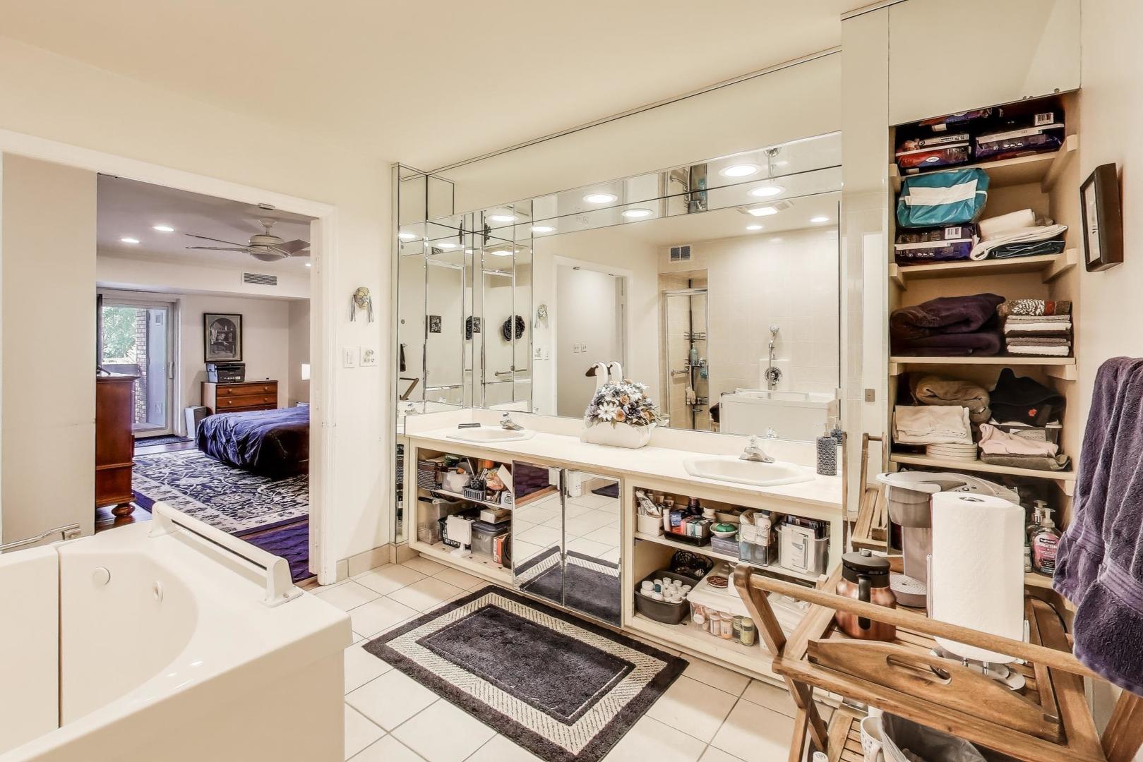 3955 Mission Hills Road, Unit D Northbrook, IL 60062 - Photo 13 of 26 a large white kitchen with lots of counter space and cabinets