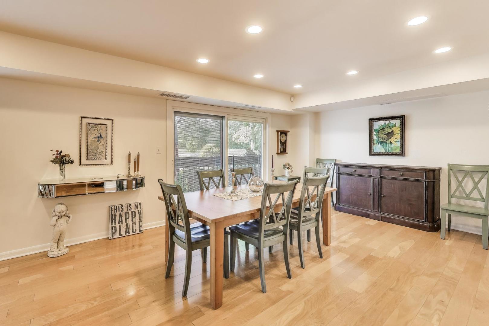 3955 Mission Hills Road, Unit D Northbrook, IL 60062 - Photo 8 of 26 a view of a dining room with furniture and a livingroom