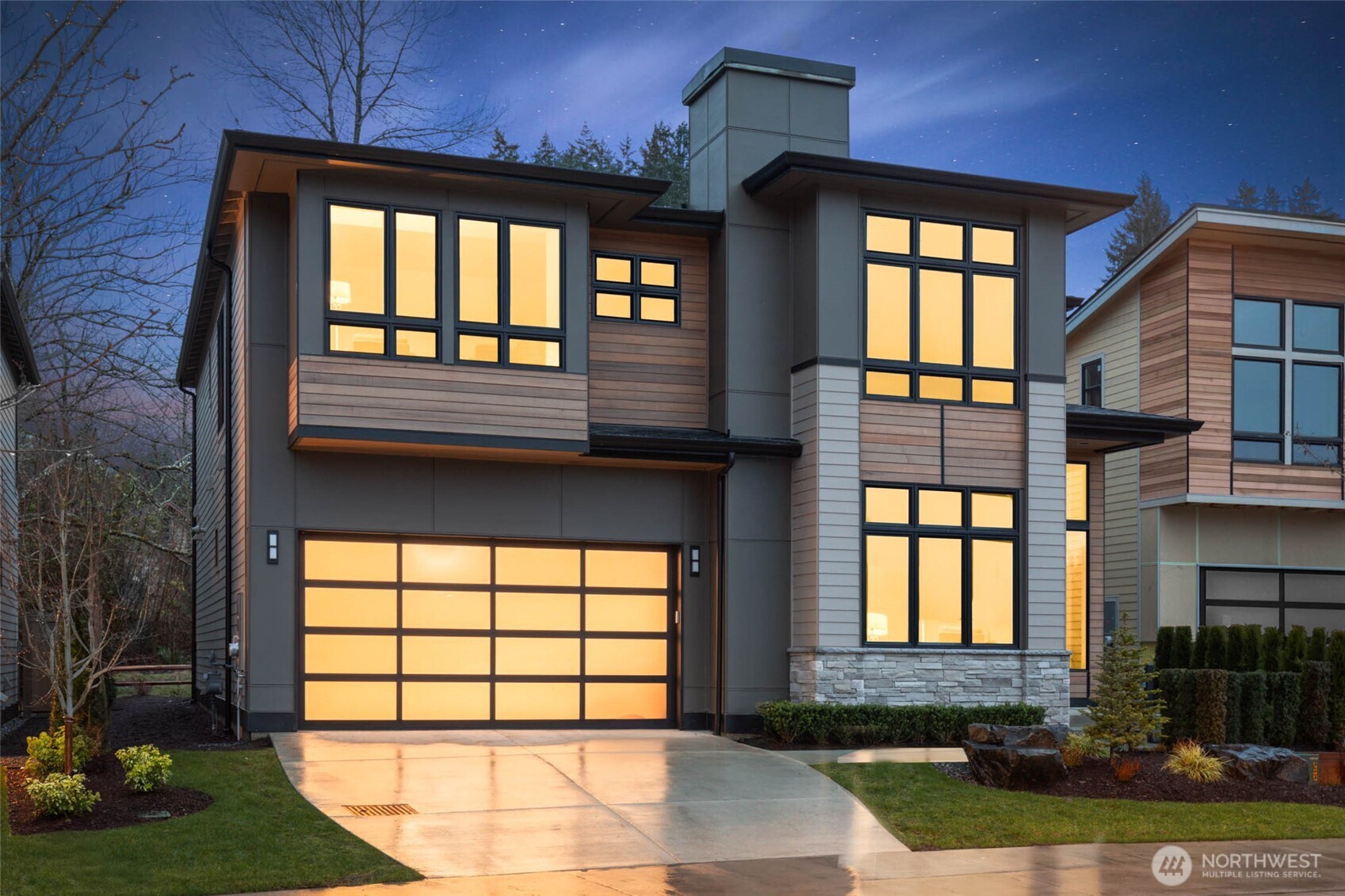 21021 Southeast 80th Street Issaquah, WA 98027 - Photo 1 of 38 a front view of a house with a yard