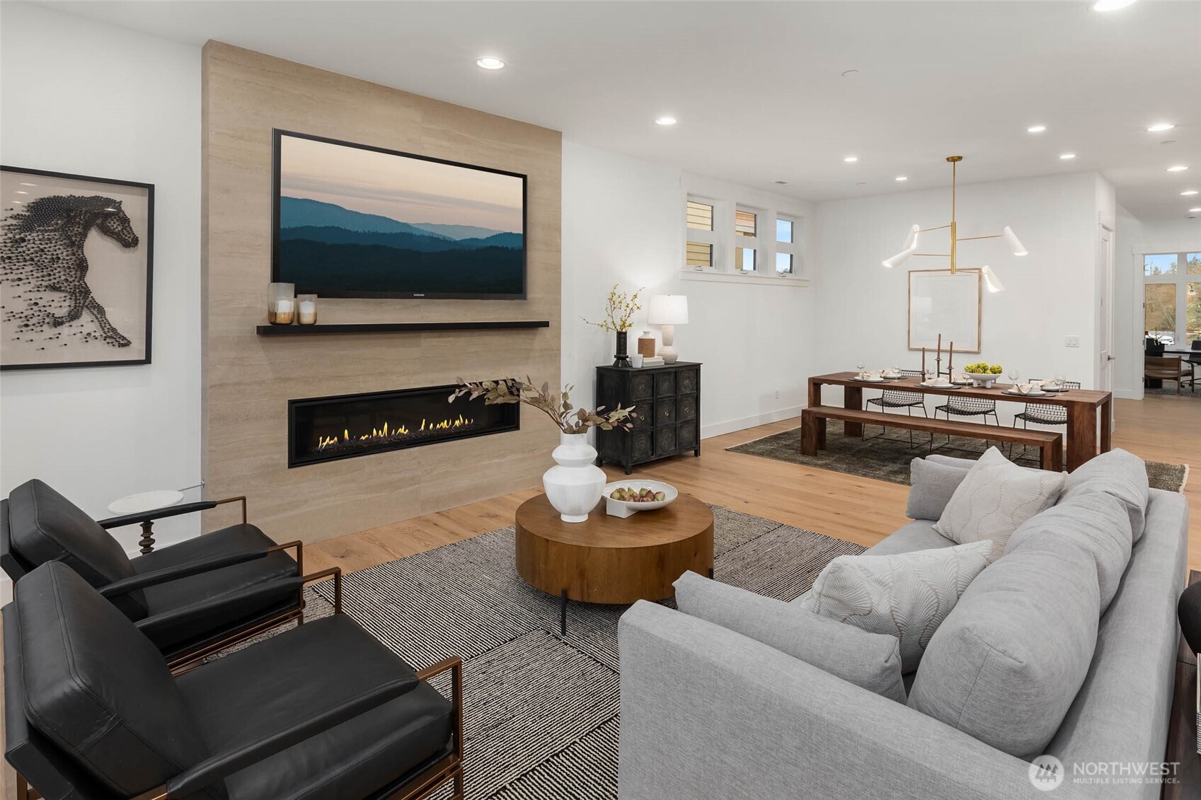 21021 Southeast 80th Street Issaquah, WA 98027 - Photo 13 of 38 a living room with furniture and a flat screen tv