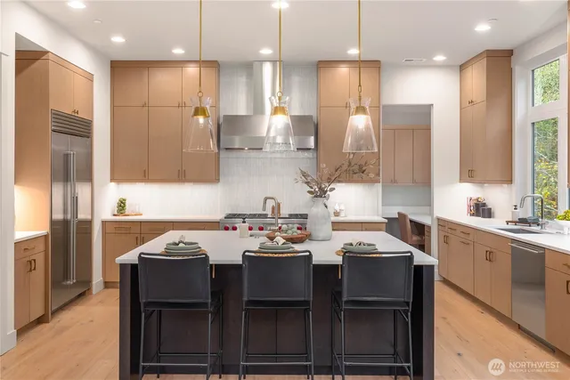 a kitchen with a sink and a window