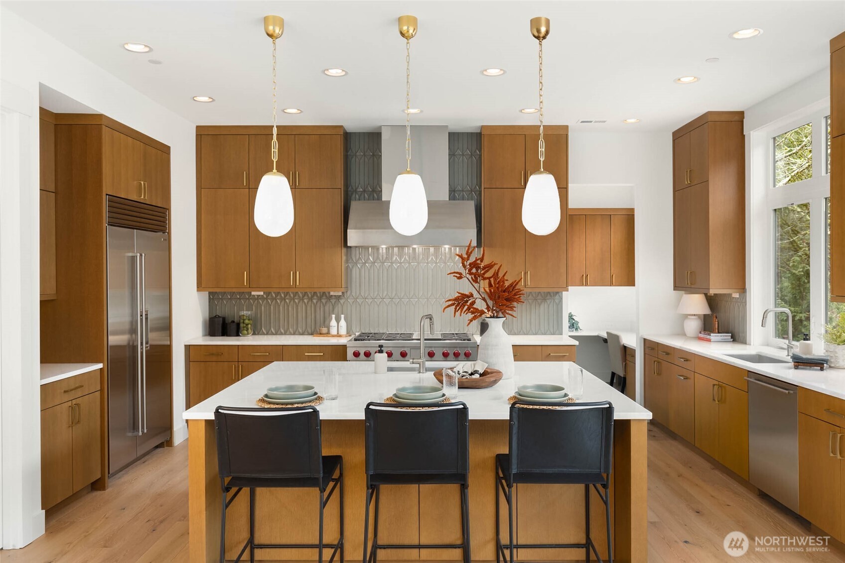 21021 Southeast 80th Street Issaquah, WA 98027 - Photo 16 of 38 a large kitchen with a table and chairs