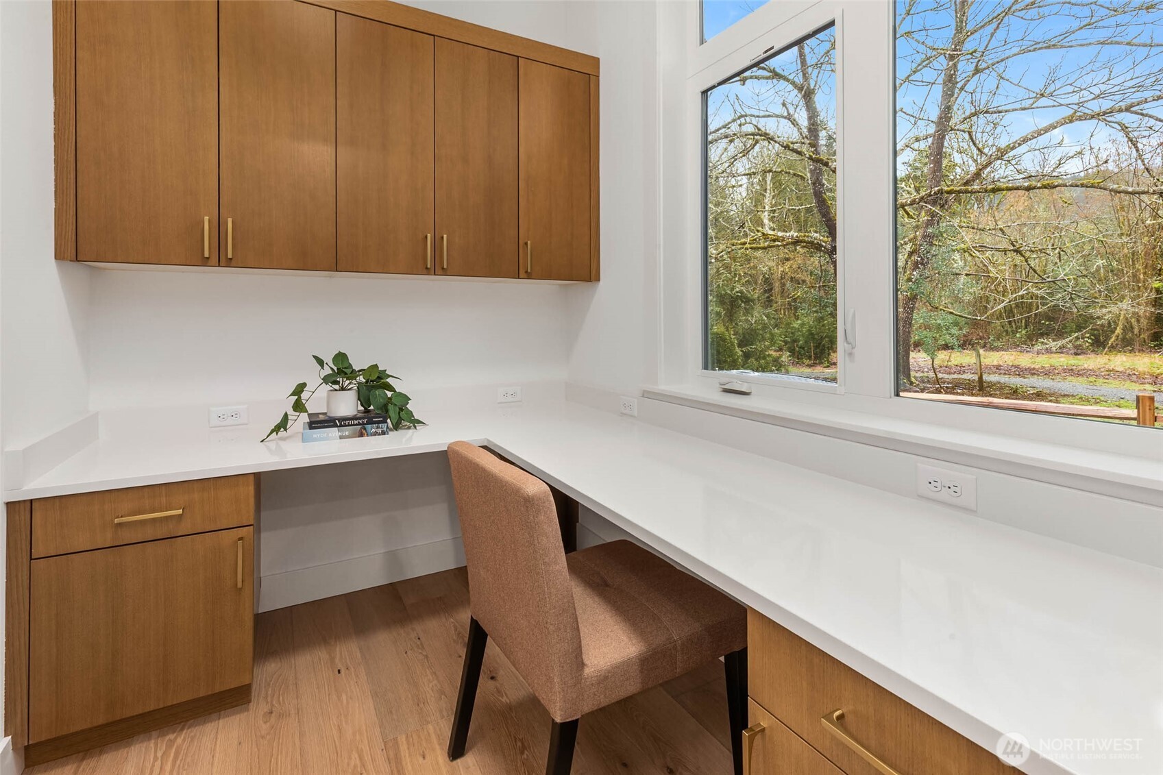 21021 Southeast 80th Street Issaquah, WA 98027 - Photo 22 of 38 a dining room with a window and furniture