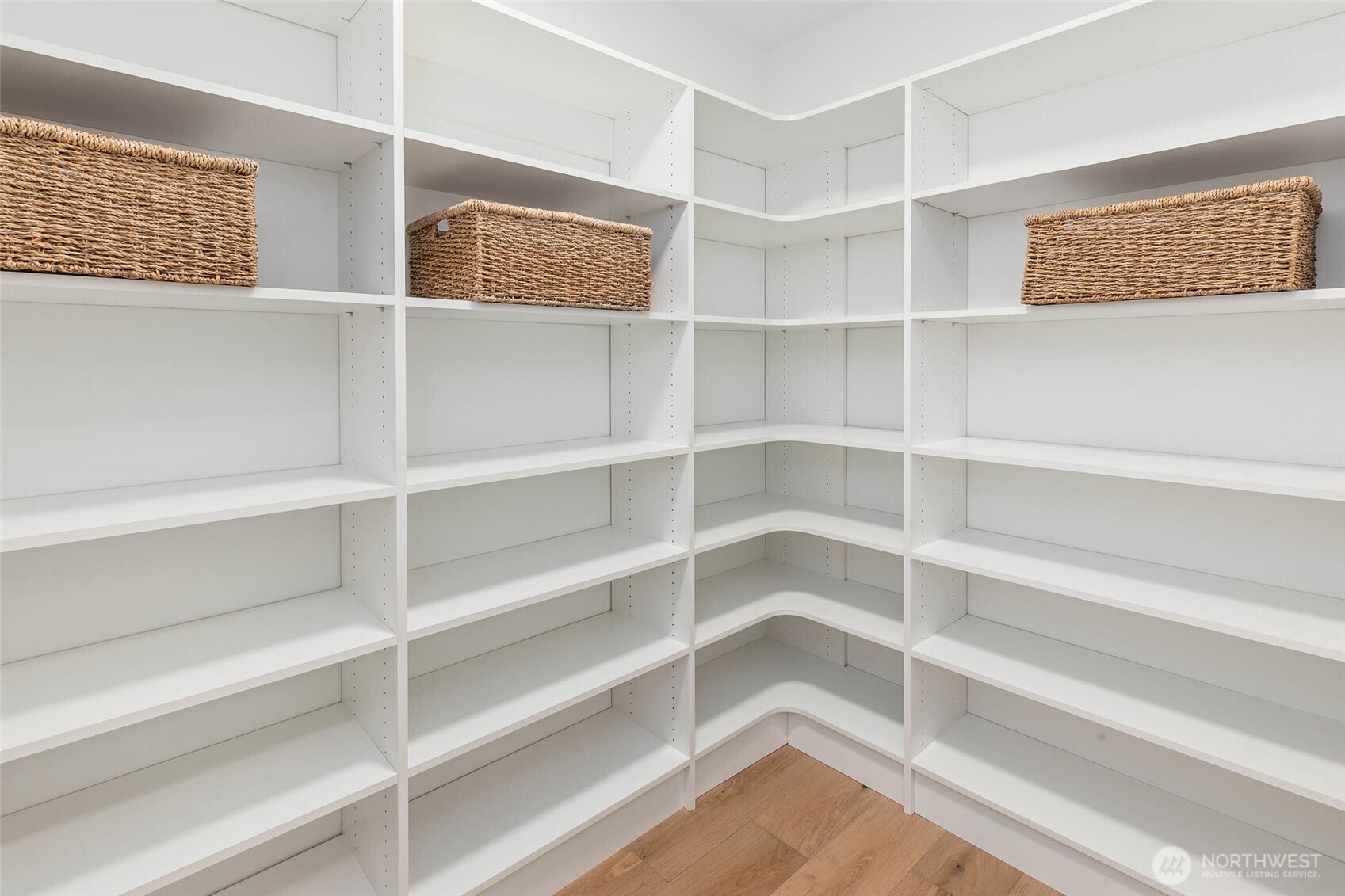 21021 Southeast 80th Street Issaquah, WA 98027 - Photo 23 of 38 a view of walk in closet with empty racks