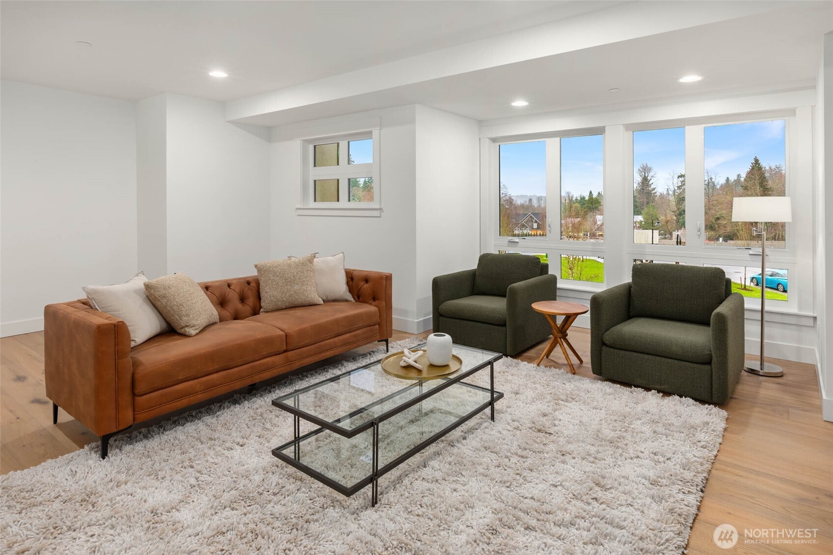 21021 Southeast 80th Street Issaquah, WA 98027 - Photo 26 of 38 a living room with furniture and a large window