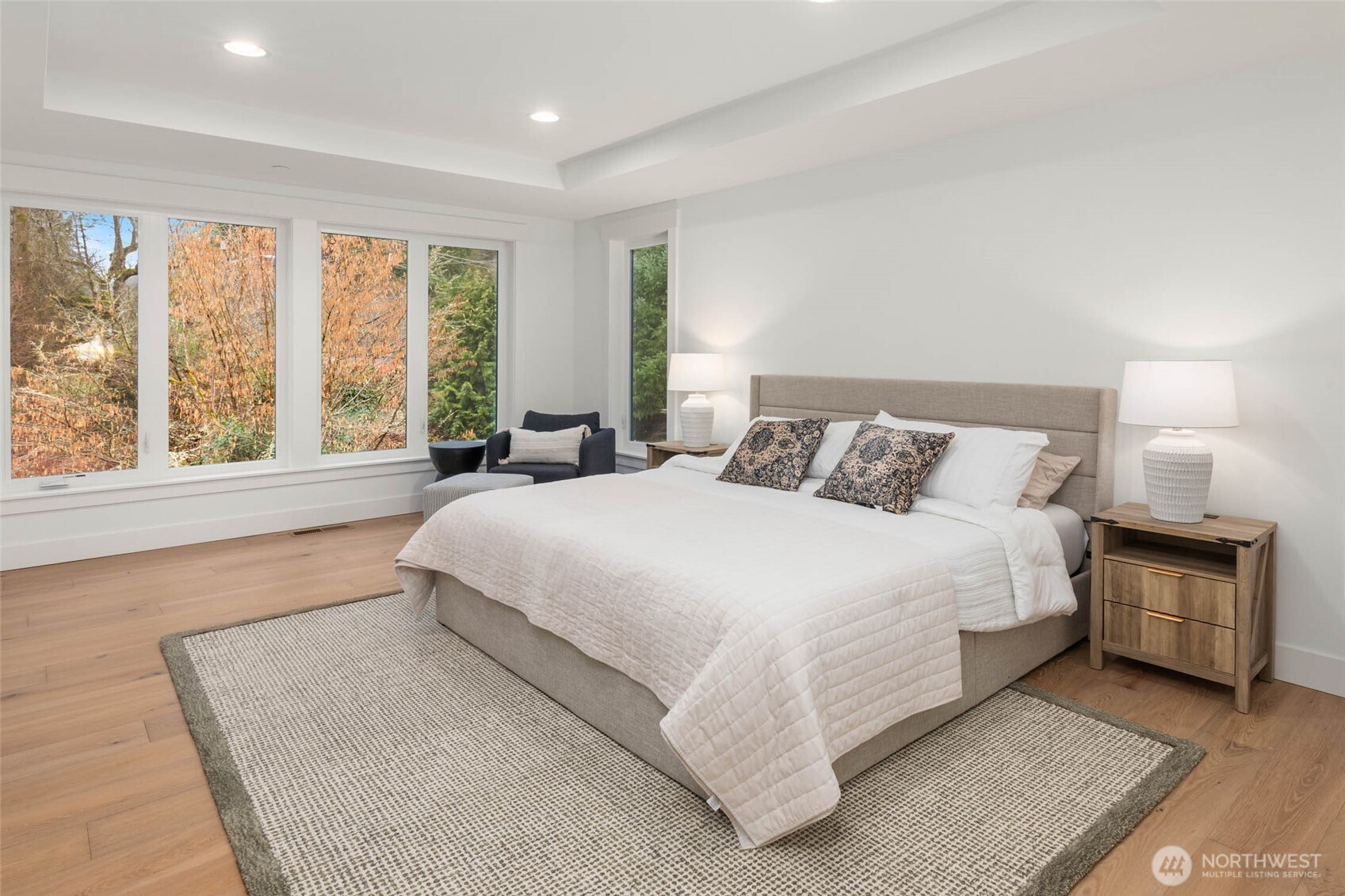 21021 Southeast 80th Street Issaquah, WA 98027 - Photo 27 of 38 a bedroom with a bed and a large window