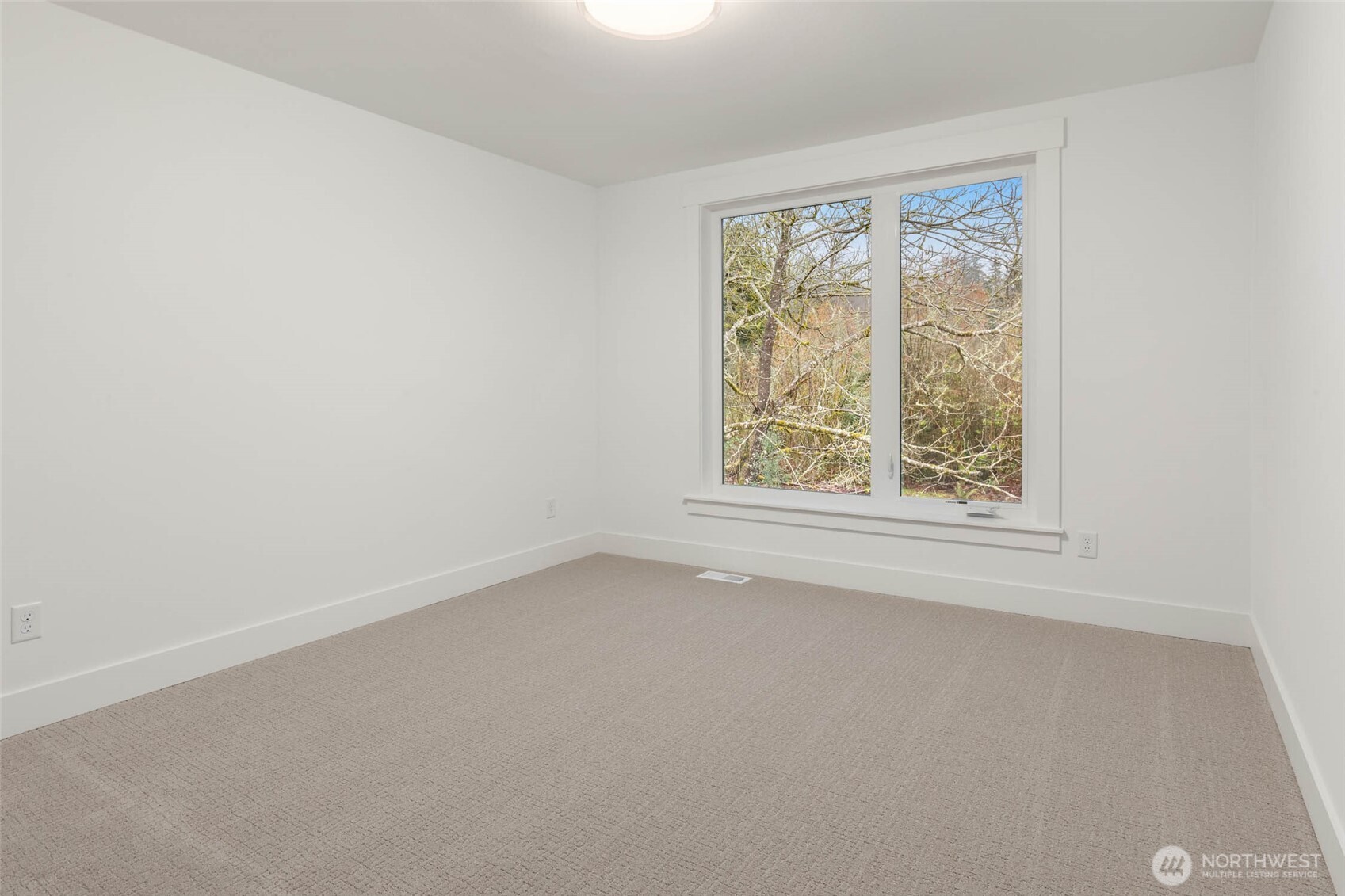21021 Southeast 80th Street Issaquah, WA 98027 - Photo 33 of 38 an empty room with a window