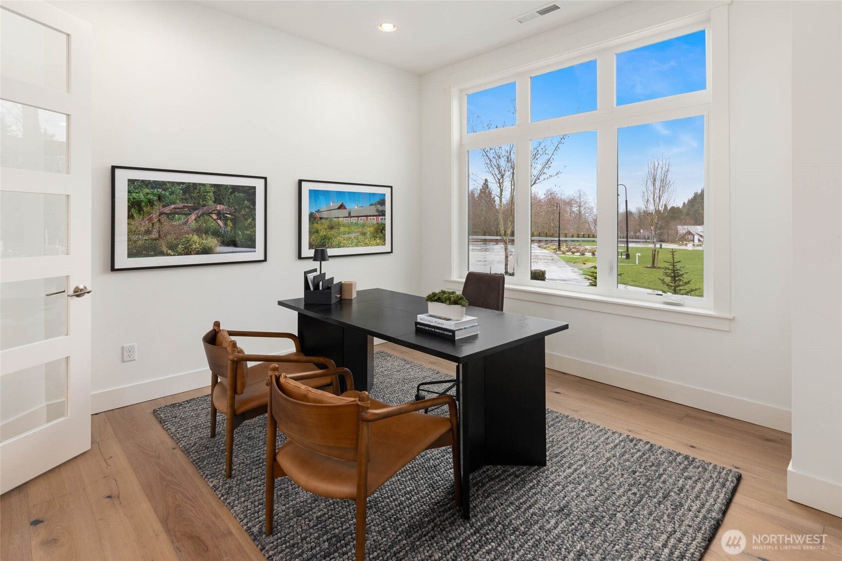 21021 Southeast 80th Street Issaquah, WA 98027 - Photo 6 of 38 a view of a workspace with furniture and a window