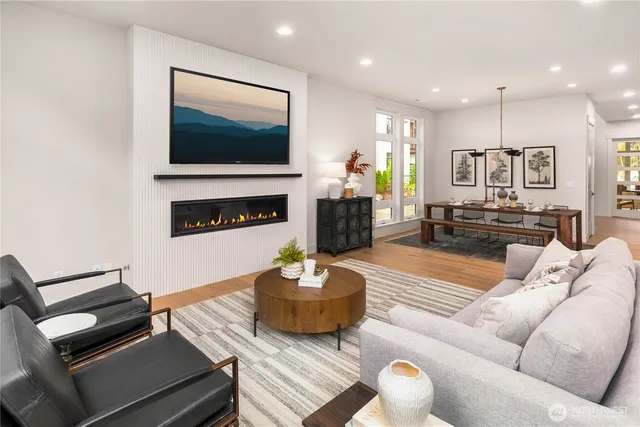 a living room with kitchen furniture and a kitchen view