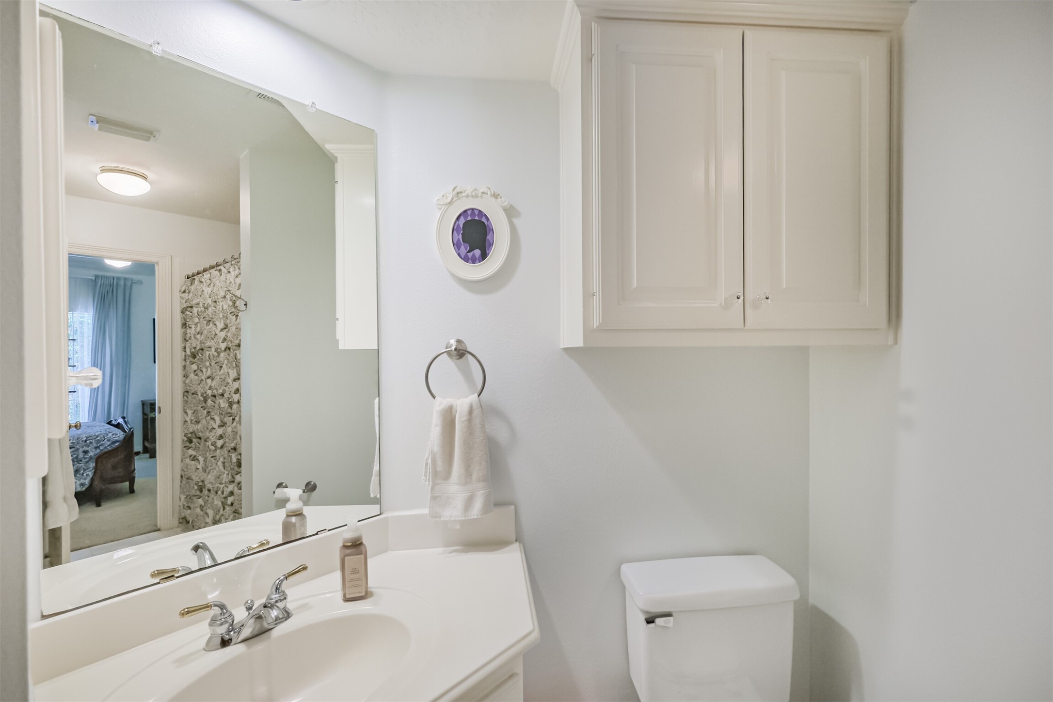 14919 Codys Run Cypress, TX 77429 - Photo 21 of 32 Private ensuite bathroom with tub and shower combination for adjoining bedroom.