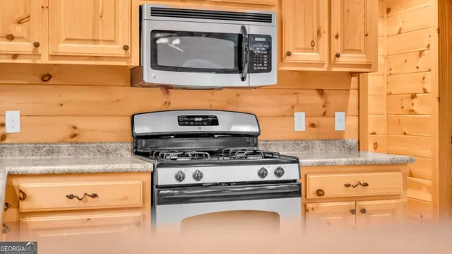 a view of balcony with wooden floor