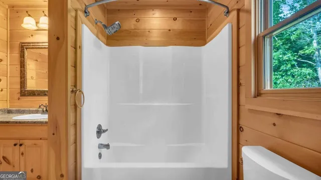 a view of a small yard from a balcony